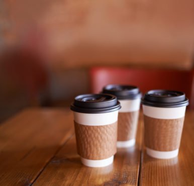 Shot of three cups of standing on a table